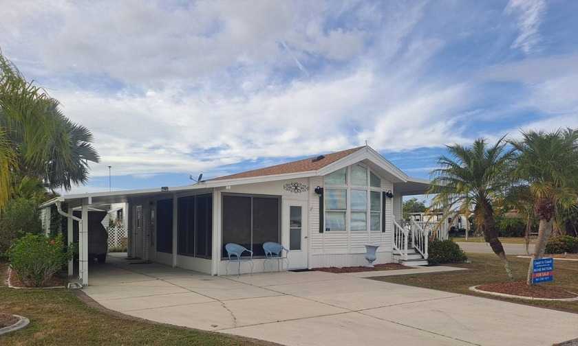 Huge Corner Lot ! Fully Furnished and Move-In Ready! Comes with - Beach Home for sale in Port Charlotte, Florida on Beachhouse.com