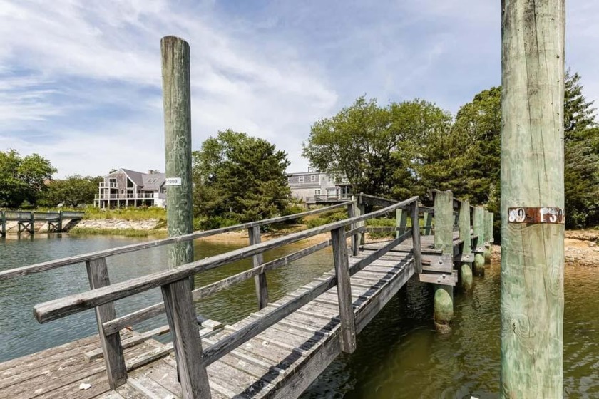 Don't miss this waterfront 3 bedroom/3.5 bath home with a dock - Beach Home for sale in North Falmouth, Massachusetts on Beachhouse.com