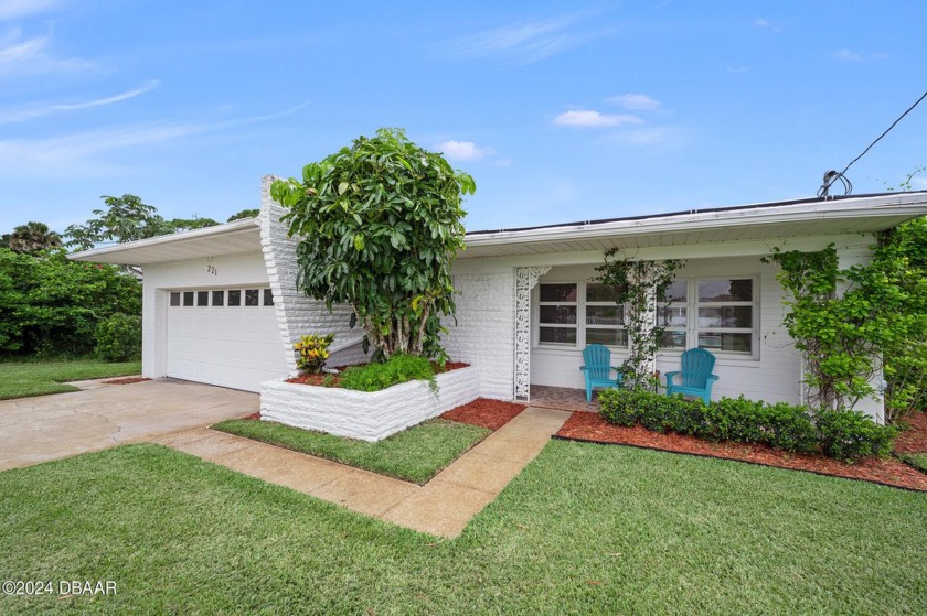 Classic mid-century pool home steps to the beach presented in - Beach Home for sale in Daytona Beach, Florida on Beachhouse.com