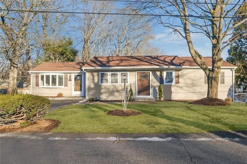 Welcome home to this beautifully updated ranch nestled in a - Beach Home for sale in Warwick, Rhode Island on Beachhouse.com