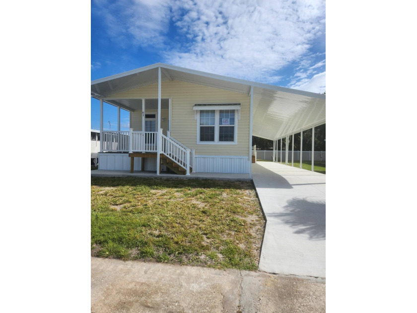 This beautiful new home on lot #61 is made by Jacobson and is - Beach Home for sale in Ruskin, Florida on Beachhouse.com