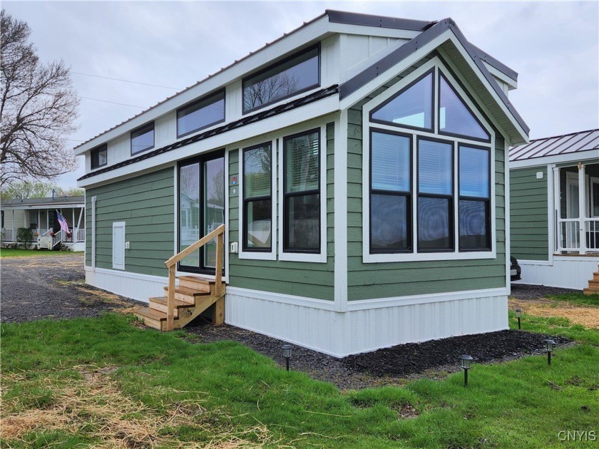 Experience this new, turnkey mobile lakeside retreat, located on - Beach Home for sale in Henderson, New York on Beachhouse.com