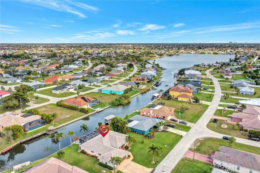 Waterfront Pool Home with room for the entire family! This - Beach Home for sale in Cape Coral, Florida on Beachhouse.com