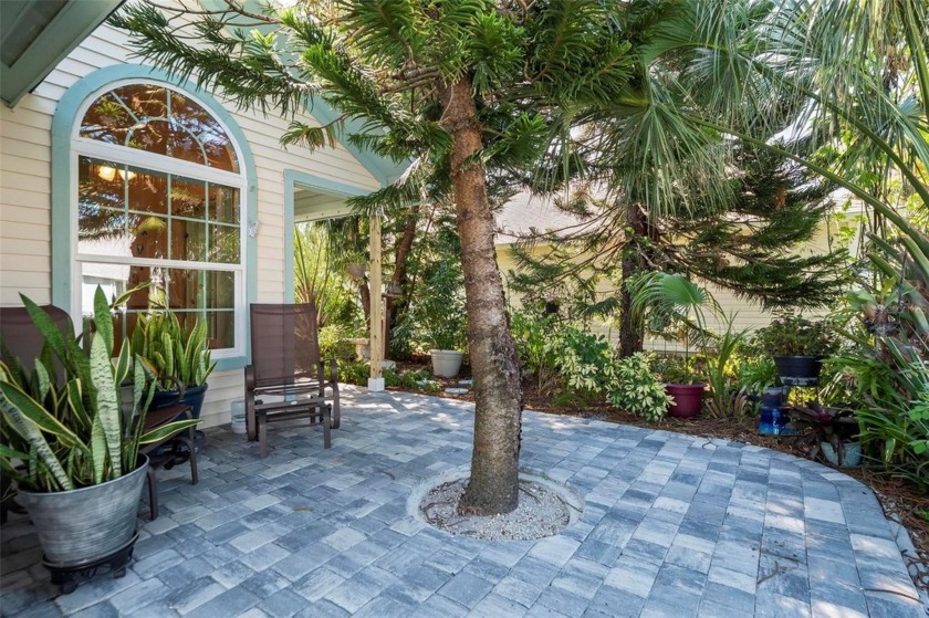 Discover the perfect blend of coastal charm and garden paradise - Beach Home for sale in Palm Coast, Florida on Beachhouse.com