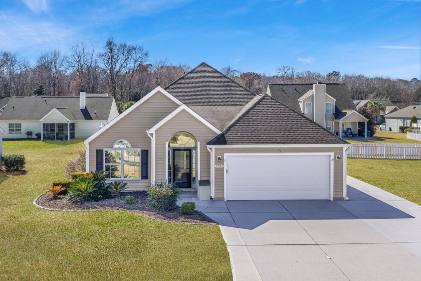 This inviting 4-bedroom, 3-bath home is nestled in the heart of - Beach Home for sale in Myrtle Beach, South Carolina on Beachhouse.com