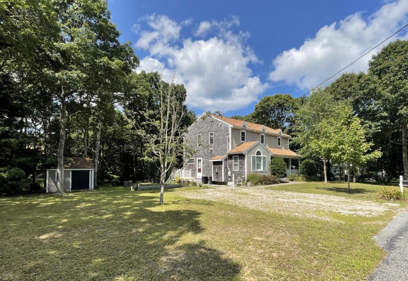 Relax on the front porch of this custom colonial home situated - Beach Home for sale in South Dennis, Massachusetts on Beachhouse.com