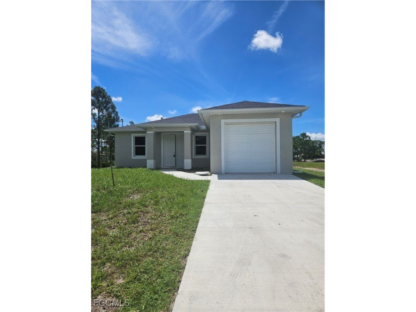 This brand-new 3-bedroom, 2-bathroom home sits on a spacious - Beach Home for sale in Lehigh Acres, Florida on Beachhouse.com