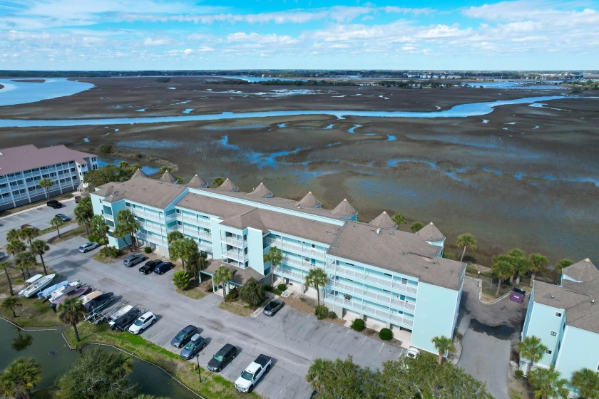 Dive into tranquility with this charming 2-bed, 2-bath condo - Beach Home for sale in Folly Beach, South Carolina on Beachhouse.com