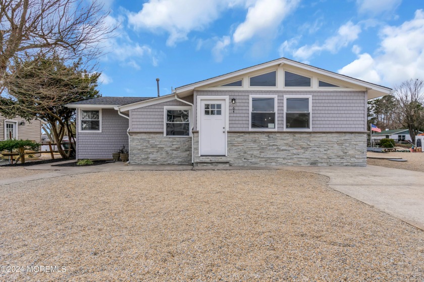 Welcome to this charming waterfront home! Step inside to - Beach Home for sale in Tuckerton, New Jersey on Beachhouse.com