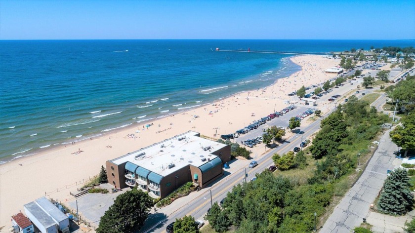 Experience lakefront living in this well-maintained Lake - Beach Condo for sale in Grand Haven, Michigan on Beachhouse.com
