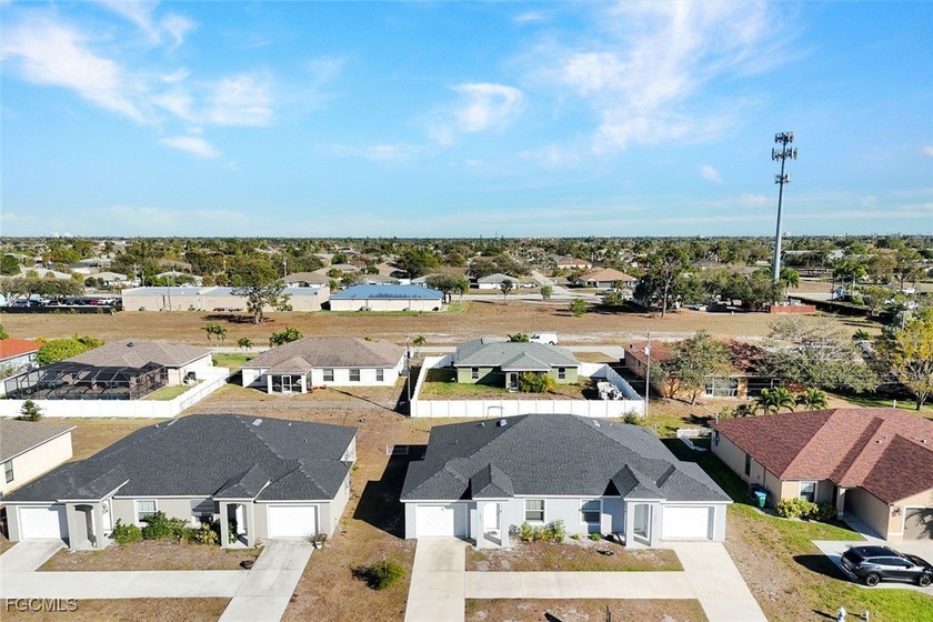 Well-maintained, income-producing duplex built in 2022, offering - Beach Home for sale in Cape Coral, Florida on Beachhouse.com