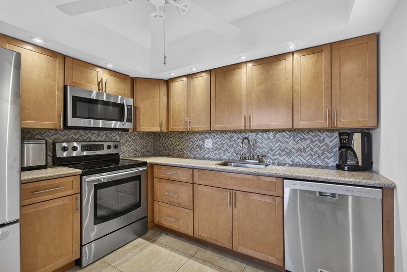 Welcome to this beautifully renovated 2 bed 2 bath spacious - Beach Condo for sale in West Palm Beach, Florida on Beachhouse.com