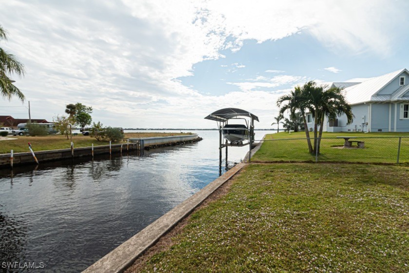 Majestic view of the river and canal overlooking a beautiful - Beach Home for sale in North Fort Myers, Florida on Beachhouse.com