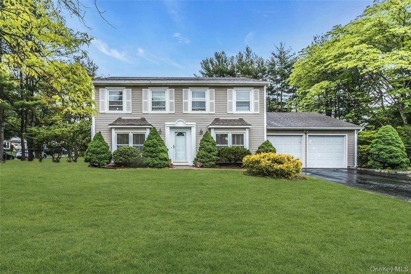 Welcome to a spacious and well-maintained Center Hall Colonial - Beach Home for sale in Stony Brook, New York on Beachhouse.com