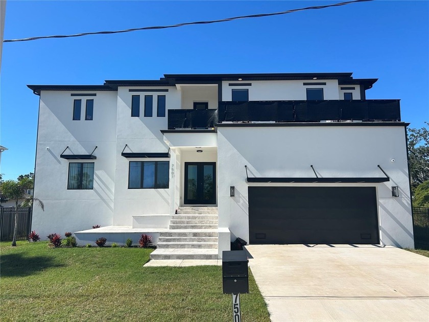 Modern new construction in Port Tampa with no HOA or CDD. This - Beach Home for sale in Tampa, Florida on Beachhouse.com