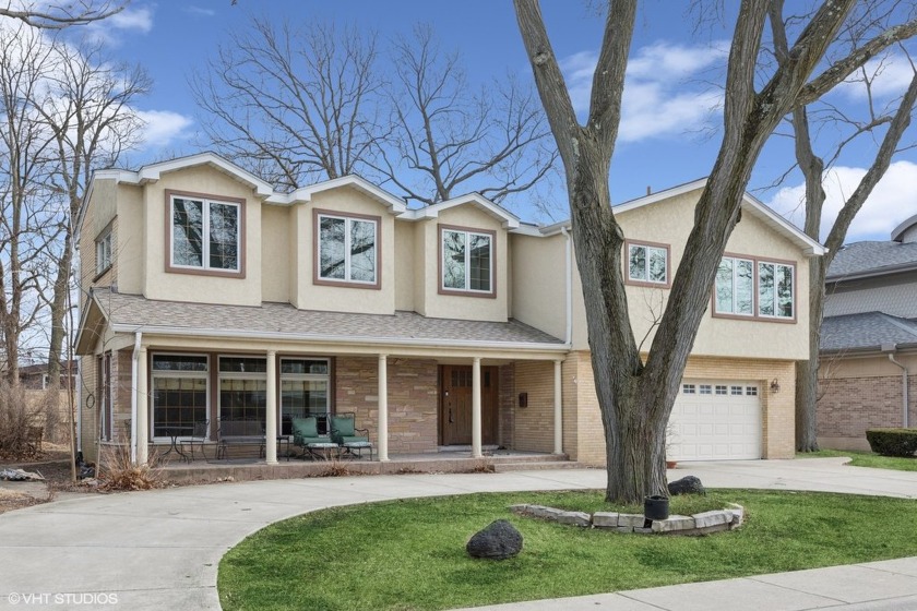 This beautifully updated 5-bedroom home, featuring 3 full and 2 - Beach Home for sale in Skokie, Illinois on Beachhouse.com