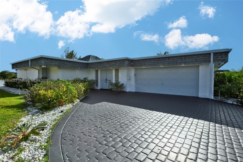Welcome to your fully remodeled lakefront haven! This stunning - Beach Home for sale in Tamarac, Florida on Beachhouse.com