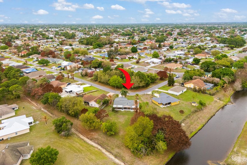 This 3/2 single-family home is situated on an oversized .40-acre - Beach Home for sale in Port Saint Lucie, Florida on Beachhouse.com
