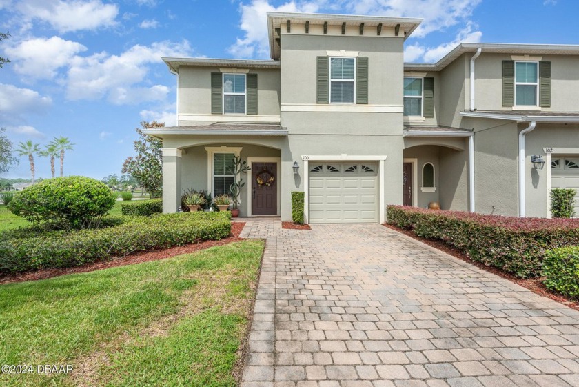 This stunning two-story end-unit townhouse on a quiet corner lot - Beach Home for sale in Daytona Beach, Florida on Beachhouse.com