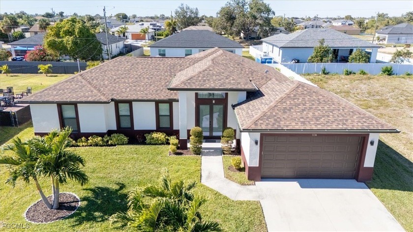 Welcome to this stunning three-bedroom, two-bathroom residence - Beach Home for sale in Cape Coral, Florida on Beachhouse.com