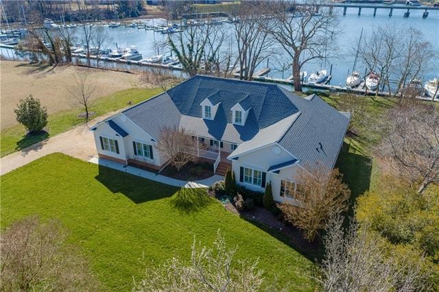 This charming waterfront home offers spectacular views of - Beach Home for sale in Urbanna, Virginia on Beachhouse.com