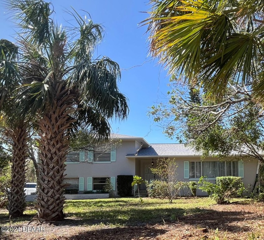 This 3-story beachside home is a true retreat, offering both - Beach Home for sale in Daytona Beach, Florida on Beachhouse.com