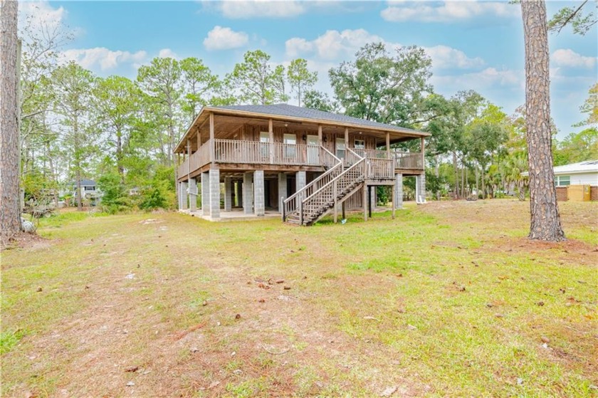 Exquisitely built country cabin on deep water canal that has - Beach Home for sale in Coden, Alabama on Beachhouse.com