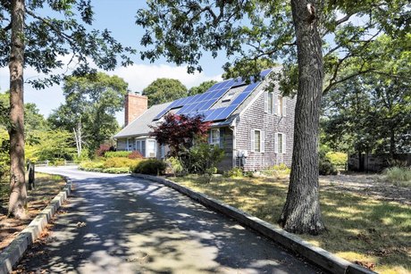 Situated on a beautiful, private wooded lot that is just .4 - Beach Home for sale in Eastham, Massachusetts on Beachhouse.com