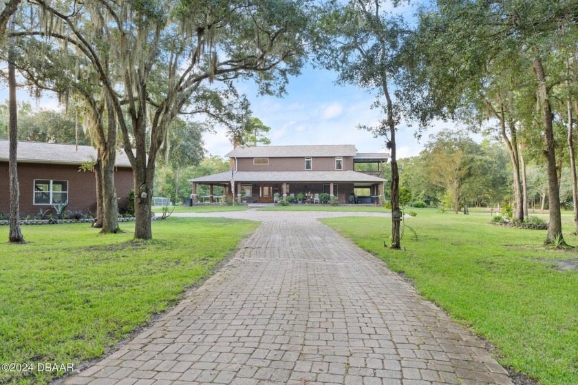 Welcome home to your dream country retreat! Nestled on a - Beach Home for sale in Bunnell, Florida on Beachhouse.com