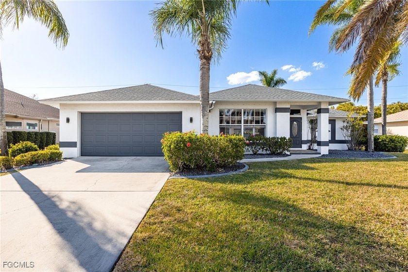 This beautifully updated home shows like a designer residence - Beach Home for sale in Cape Coral, Florida on Beachhouse.com