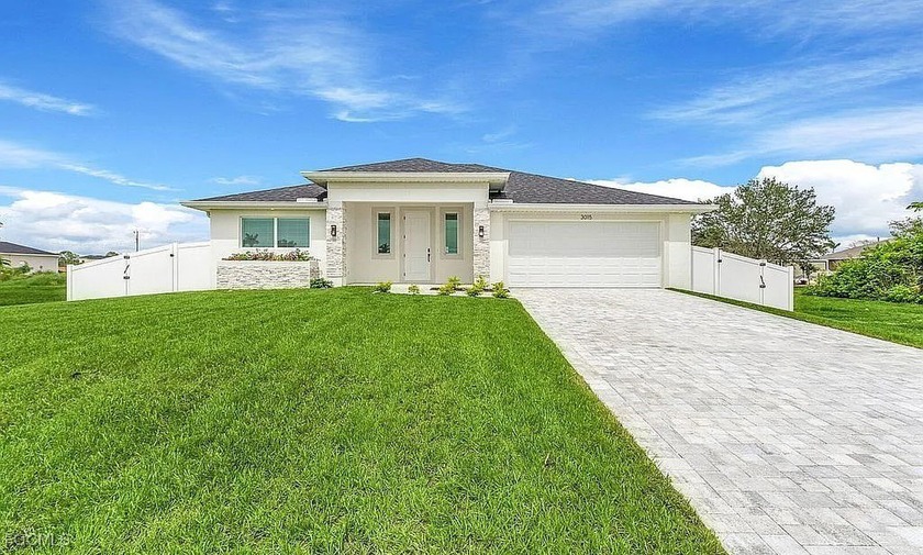 Step into this stunning better-than-new 2023 pool home, offering - Beach Home for sale in Cape Coral, Florida on Beachhouse.com