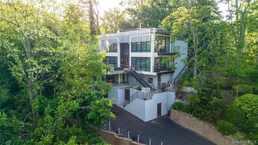 Rare to find modern house with elecator built on a hill. Four - Beach Home for sale in Glenwood Landing, New York on Beachhouse.com