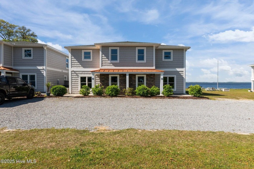 Welcome to your serene waterfront retreat at 1129 Bennett Road - Beach Condo for sale in Minnesott Beach, North Carolina on Beachhouse.com
