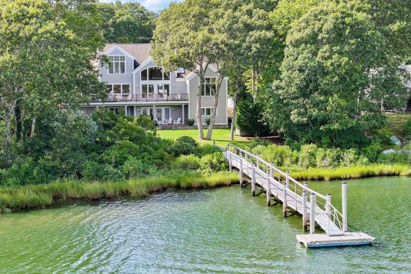 Welcome home to this extraordinary waterfront property that - Beach Home for sale in East Falmouth, Massachusetts on Beachhouse.com