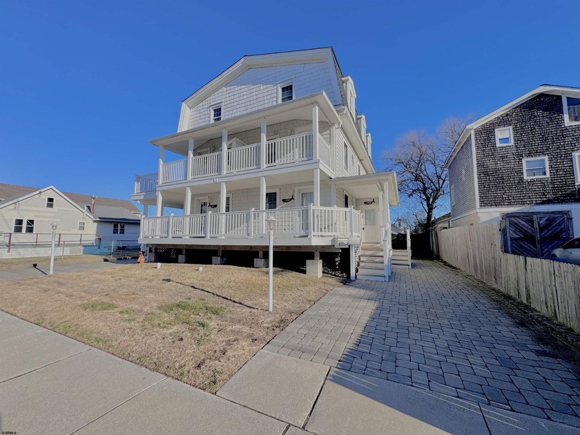 Welcome to 409 W Oak Avenue, a spacious 4-bedroom, 2.5-bath - Beach Condo for sale in Wildwood, New Jersey on Beachhouse.com