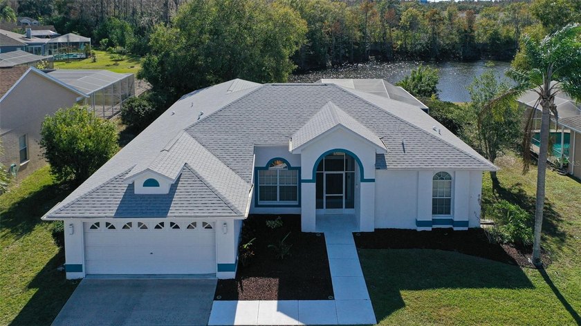 MOVE IN READY! GREAT OPPORTUNITY! STUNNING well-maintained home - Beach Home for sale in New Port Richey, Florida on Beachhouse.com