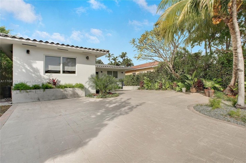 Steps from the beach and shops of Bal Harbour, this 5BR/ 4BA - Beach Home for sale in Surfside, Florida on Beachhouse.com