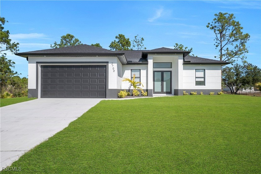 Welcome to this brand-new home located on a corner lot in Lehigh - Beach Home for sale in Lehigh Acres, Florida on Beachhouse.com