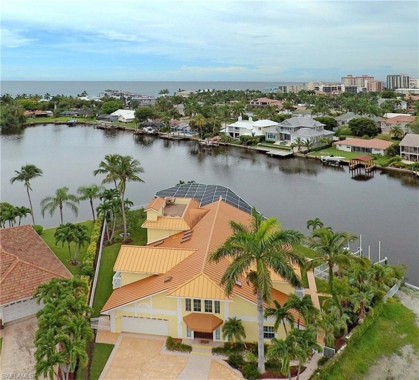 One of the few coveted waterfront properties on a large point - Beach Home for sale in Naples, Florida on Beachhouse.com