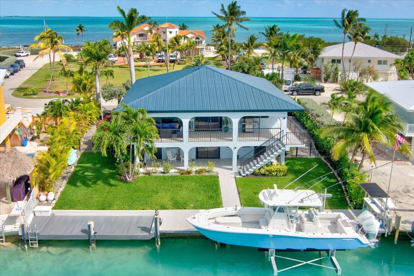 Exquisite canalfront home located on the prestigious Yacht Club - Beach Home for sale in Duck Key, Florida on Beachhouse.com