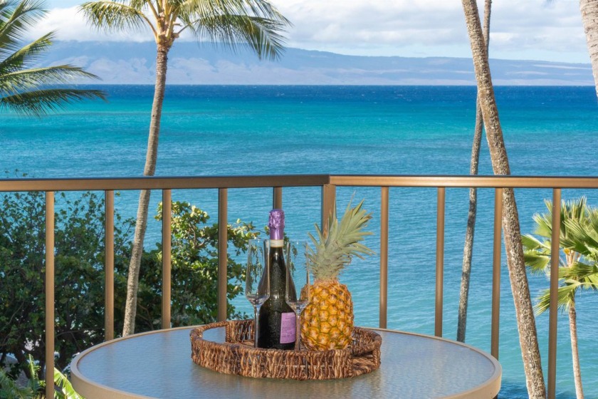 The swaying palms of paradise await at Valley Isle Resort - Beach Condo for sale in Lahaina, Hawaii on Beachhouse.com