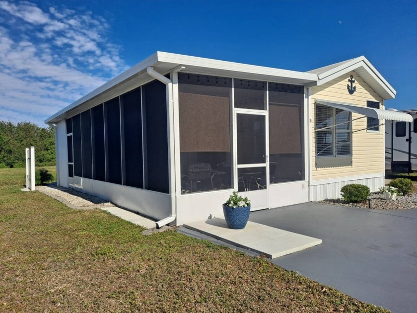 This Home Is Immaculate in Everyway ! Situated Right On the Lake - Beach Home for sale in Port Charlotte, Florida on Beachhouse.com