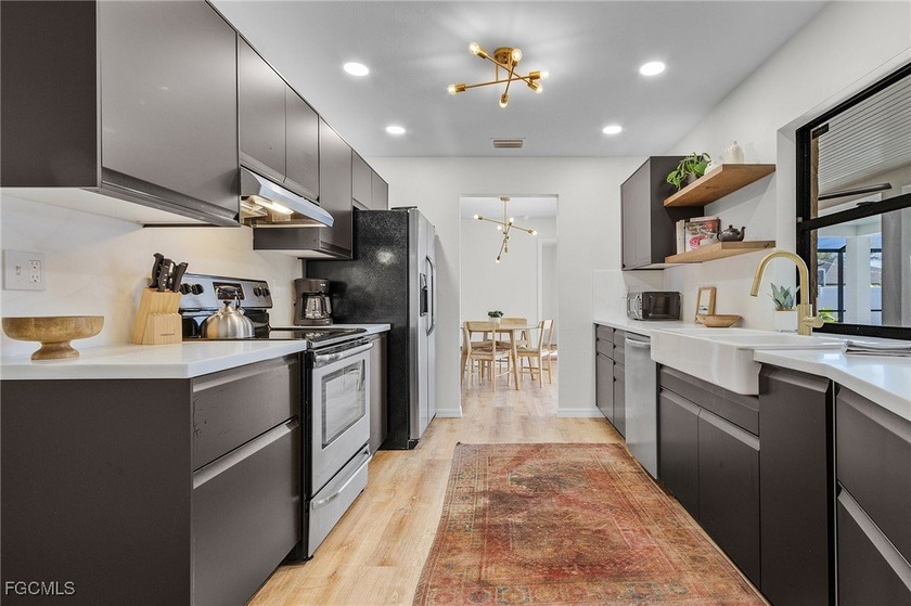 Enjoy Florida living in this beautifully updated 3-bedroom - Beach Home for sale in Cape Coral, Florida on Beachhouse.com