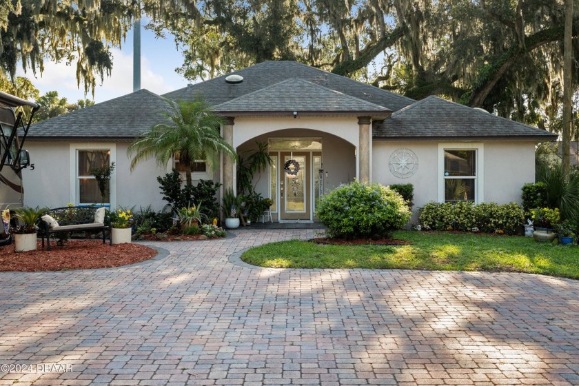 Welcome to your stunning riverfront home! This spacious - Beach Home for sale in Ormond Beach, Florida on Beachhouse.com