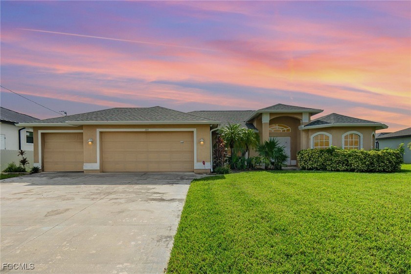 Step inside this 3 bedroom + den, 2 bath, pool home that is on - Beach Home for sale in Cape Coral, Florida on Beachhouse.com