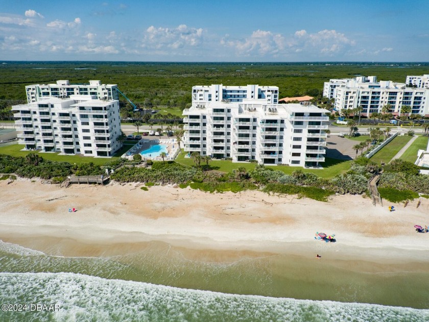 Imagine waking up each morning to the soft hues of sunrise over - Beach Condo for sale in New Smyrna Beach, Florida on Beachhouse.com