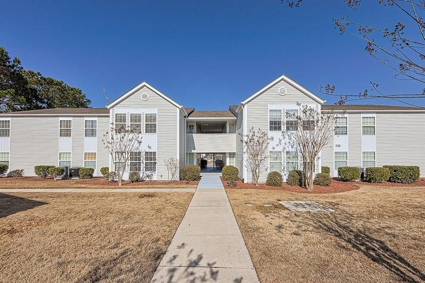 Welcome home to this beautifully maintained 3-bedroom - Beach Condo for sale in Surfside Beach, South Carolina on Beachhouse.com