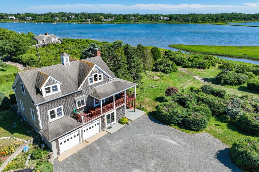 Waterfront property on the Oyster Pond with an existing 2 - Beach Home for sale in Chatham, Massachusetts on Beachhouse.com