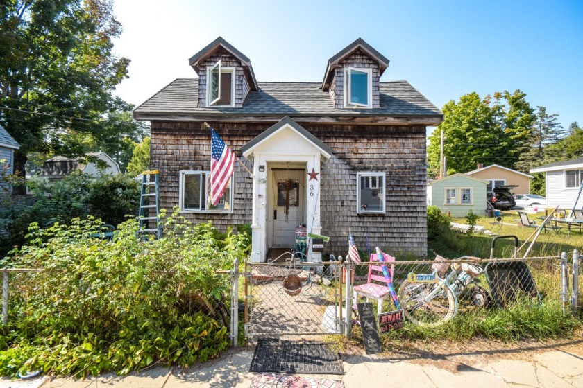 Just steps away from the iconic sands of Old Orchard Beach, this - Beach Home for sale in Old Orchard Beach, Maine on Beachhouse.com