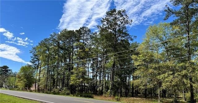 Prime commercial acreage with 504 feet of frontage directly on - Beach Acreage for sale in Mandeville, Louisiana on Beachhouse.com